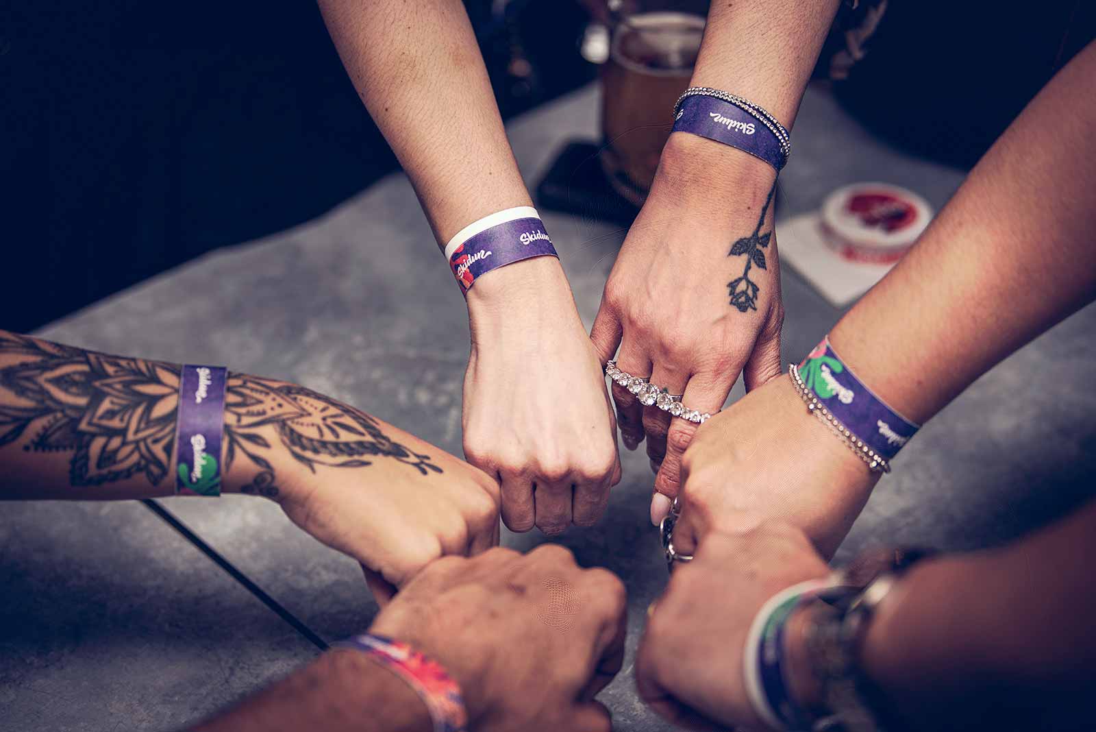 Skidun wristbands gathered on the table